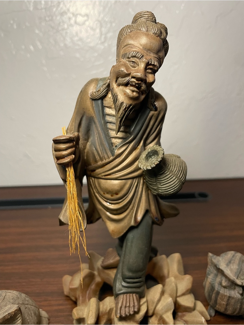 Vintage Hand-Carved Asian Fisherman with Two Carved Wooden Owls